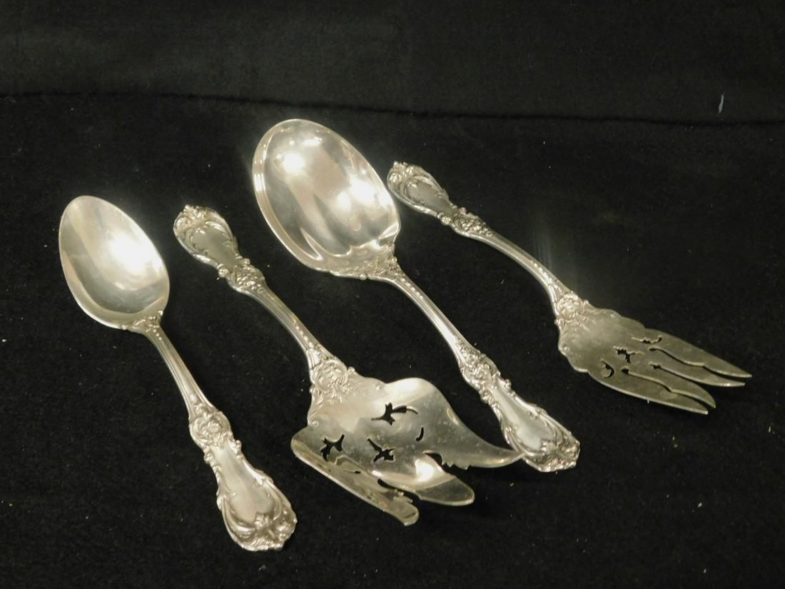 4 Reed & Barton Sterling Serving Pieces: 4 Reed & Barton Sterling Serving Pieces, Burgundy pattern, 1949, includes: 9 1/4" serving spoon and fork, a 9" cold meat fork and a 8 1/4" tablespoon; 16.2 ozts TW. CONDITION: Very good used condition
