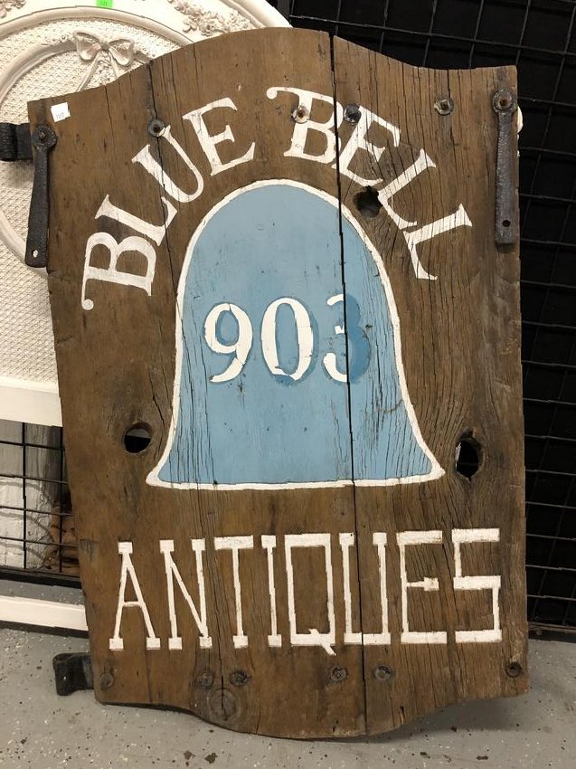 Vintage "Antiques" Double Sided Sign: Vintage "Antiques" double sided sign weathered and painted 3 board knotty pine sign with arched top and base; large wrought iron hardware; one side painted "Blue Bell 903 Antiques", "Verso painted "90