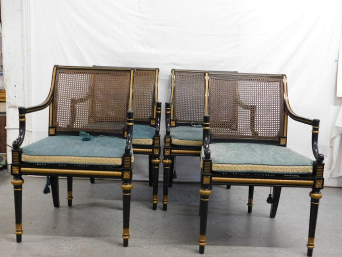 Set of 4 Baker Arm Chairs: Set of 4 Baker Arm Chairs, Federal style, ebonized finish with gilt highlighted ring and rosette carvings, open arms, caned seats and backs, 20th C, 36"h. CONDITION: Very fine.
