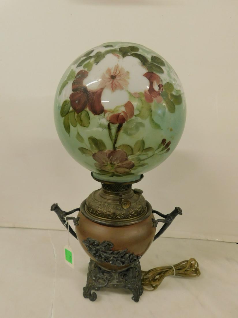 Victorian Gone With The Wind Lamp: Victorian Gone With The Wind Lamp, bulbous copper base with brass font, cast metal twig handles, applied floral designs and base with scroll feet, diameter green and floral painted ball shade, late 19