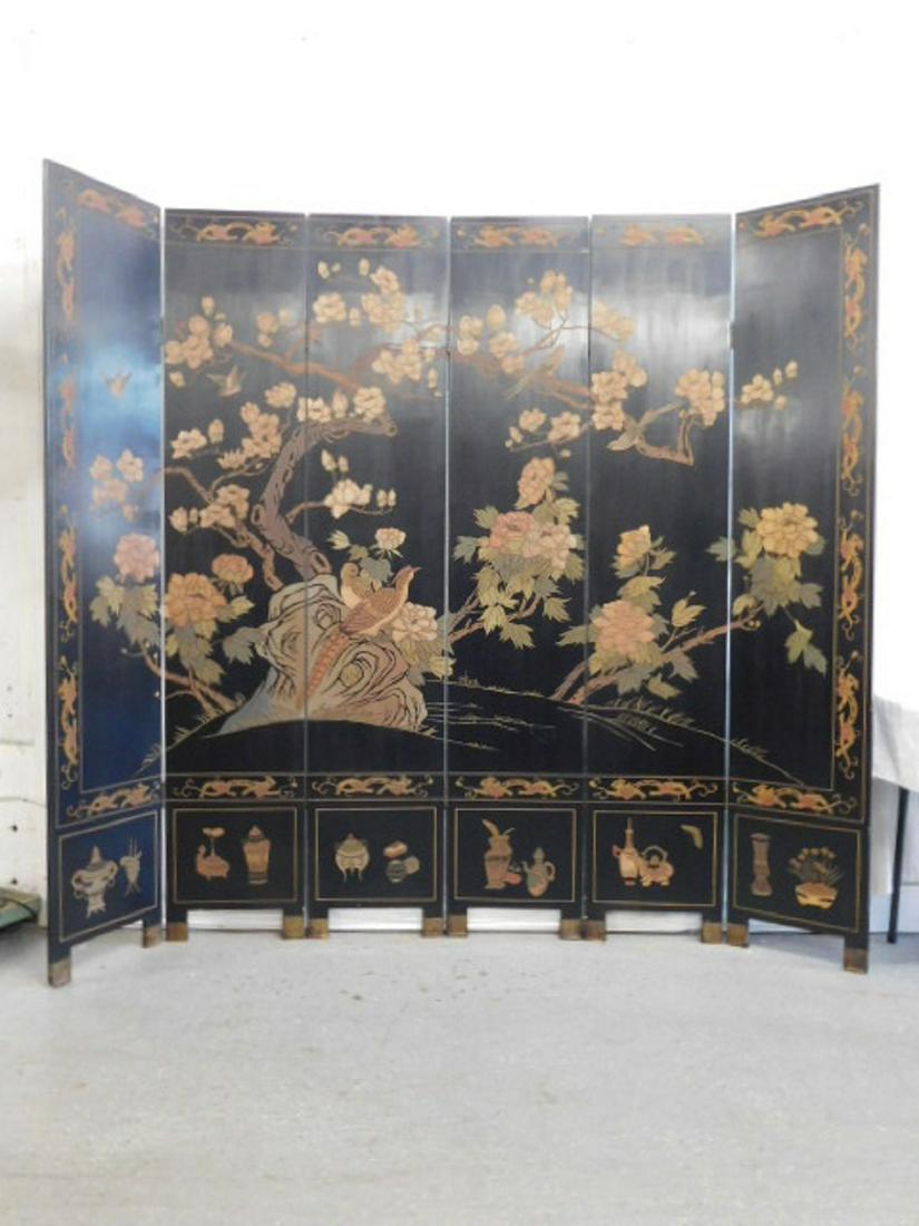 Chinese Coromandel Screen: Chinese Coromandel Screen, six panels, black lacquered with relief carved and polychromed floral and bird panels, 20th C, 84"h, approx 96"l. CONDITION: Very good