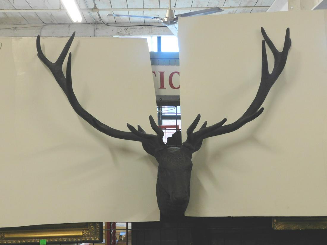 Deer Head Sculpture: Deer Head Sculpture, large scale composition with a pair of seven point antlers, wall mount, late 20th C, approx 40"h, 52"l, 18"d. CONDITION: Very good.