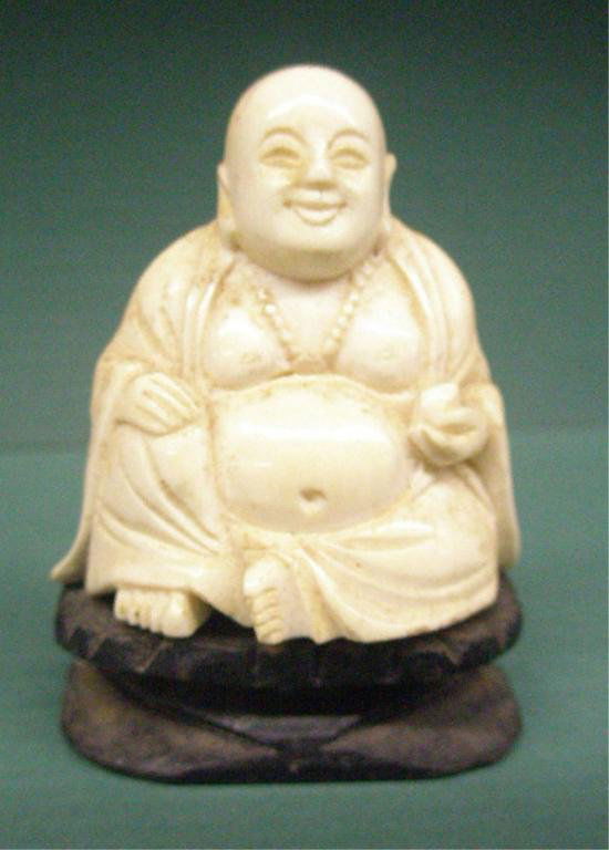 Chinese Carved Seated Ivory Buddha: Chinese carved seated ivory Buddha, figure hgt 2 3/8" sits upon wood base ...NO INTERNATIONAL SHIPPING...