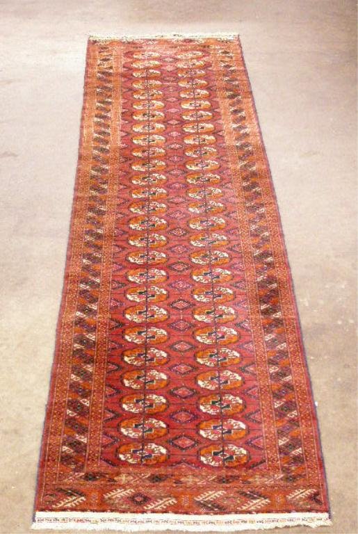 Semi-antiqueTurkoman Carpet, : Semi-antique Turkoman carpet, 2'10" x 9'9", German label, wine red ground w/ivory, rust & blue medallians, mid 20th c.