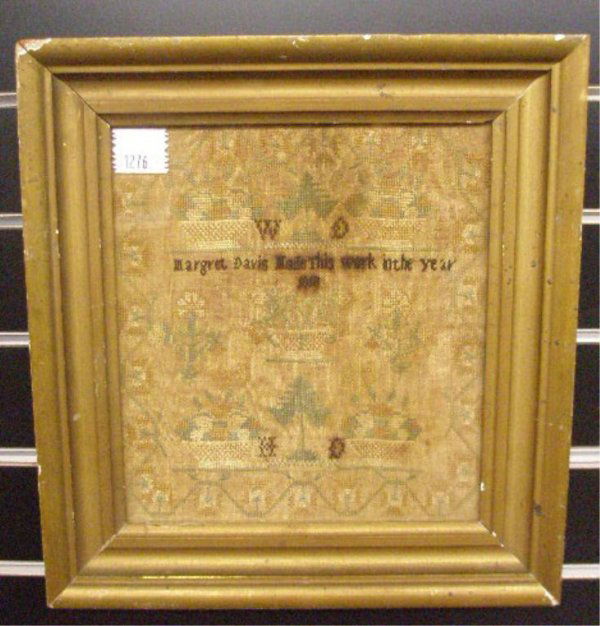 Framed Early 19th c. Sampler: C. 1818 framed 12 3/4" x 13 1/2" floral & fruit basket sampler, signed "Margaret Davis made this work in the year 1818"
