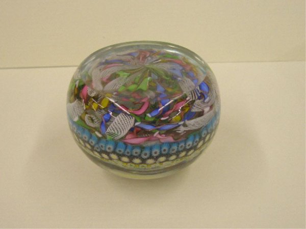 Unknown French Crystal Paperweight: Unknown late 19th c. French crystal 3 1/2" paperweight, multi colored canes set on multi colored latticinio background