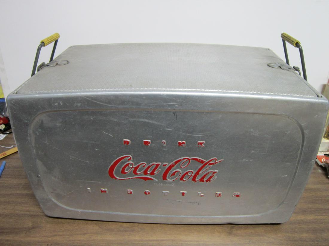 Vintage 1960s Insulated Aluminum Coke Cooler: Vintage 1960s Insulated Aluminum Coke Cooler, double handled with side, "Drink Coca-Cola in Bottles" (red painted on both sides), Progress Refrigeration Co., 13 5/8" x 23 1/2" x 13"h. CONDITION: Some