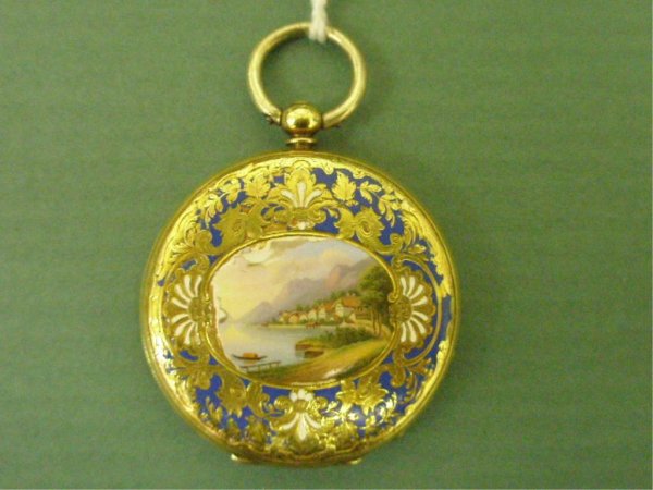 14k & Enamel Lapel Watch: Enameled gold lapel watch, tested 14k gold, village/lake scene enamel work, Moulin, Geneva Key wind 33mm diam. movement, floral engraved gold dial