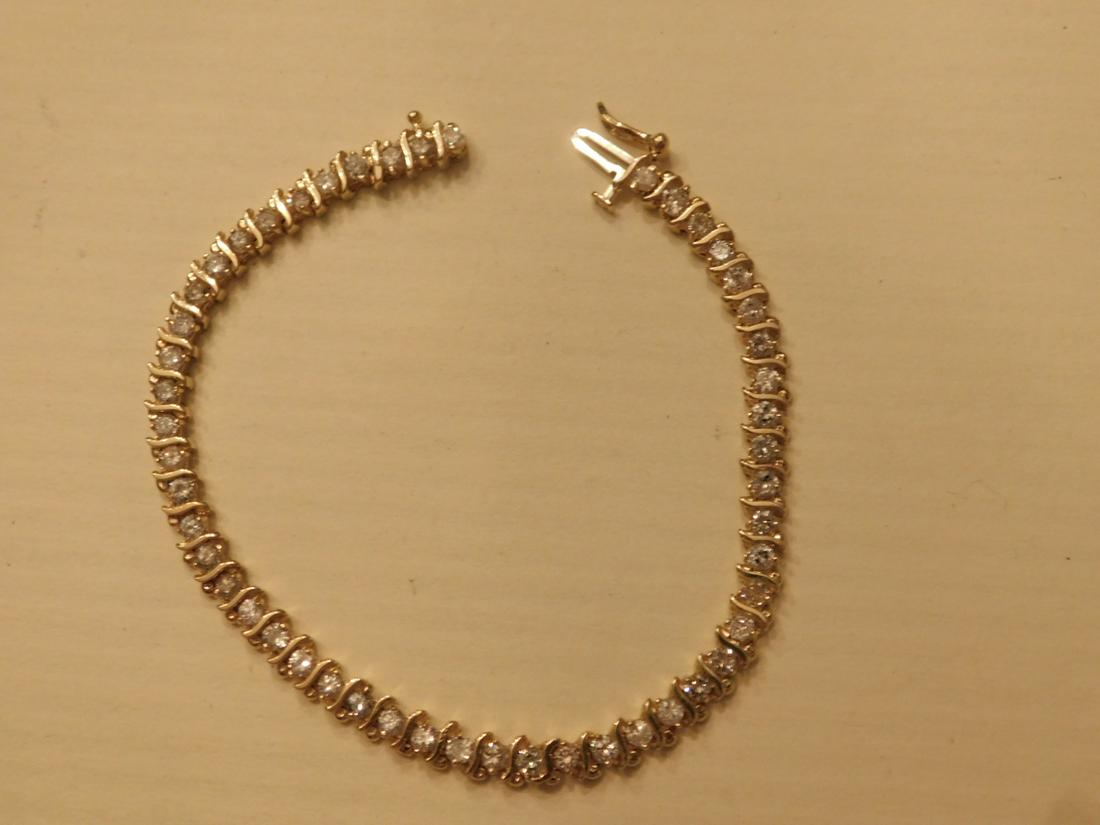 Ladies 18k YG, Diamond Tennis Bracelet: Ladies 18k YG, Diamond Tennis Bracelet, approx. 3.50 cts TW in 50 round brilliant cut diamonds, 7"l; 7.3 DWT.[15] CONDITION: Very fine, lightly used cond.
