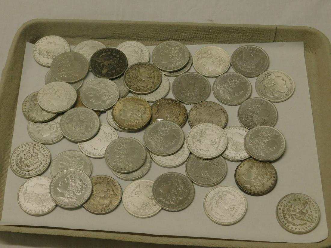 46 Morgan Silver Dollars: Forty - six Morgan Silver Dollars, 1878, two 1879, four 1880, two 1881, two 1882, 1882 S, two 1883, four 1884, two 1884-0, two 1885, two 1886, 12886-0, 1888, 1888-0, two 1889, 1889-0, 1892, three 1900