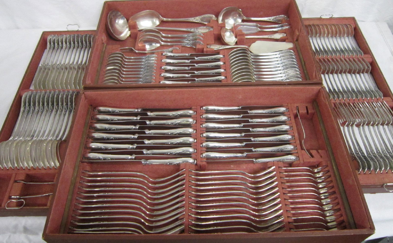 168 Pc German Sterling Silver Flatware Set: 168 Pc German Sterling Silver Flatware Set, marked sterling silber (German for silver) and 925, features a shell scroll bordered ovoid crest; includes: twelve - 8 1/2" dinner forks; twelve - 9 1/2" ho