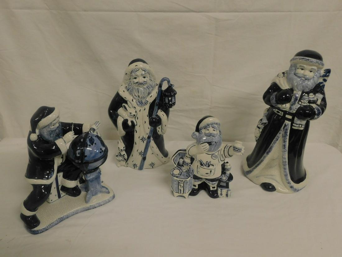 4 Delft Style Santa Figures: Four Delft Style Santa Figures, marked "Limited Edition Spxo ? USA", one signed in gold marker "R.M. Slank ? 03"; includes: 14" Santa with toys, 12 1/2" Santa with rabbit, 10 1/2" Santa with globe, an