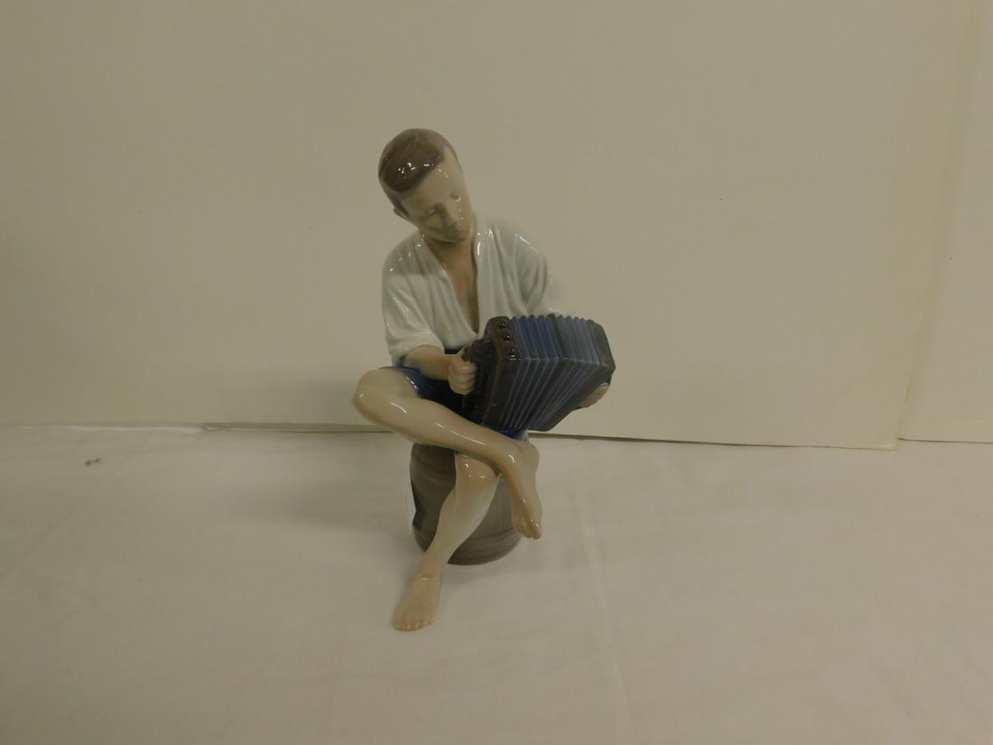 Bing & Grondahl Figurine: Bing & Grondahl Figurine, No. 1661 Merry Sailor with accordion, mid 20th C. 9"h. CONDITION: Very good.