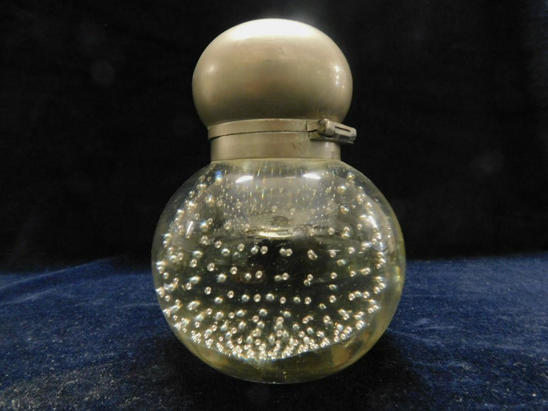 Pairpoint Inkwell: Pairpoint Inkwell, bubble interior clear glass paperweight form, pewter hinged domed lid; not signed, 19th C, 5"h. CONDITION: Some scratches and nicks to pewter.