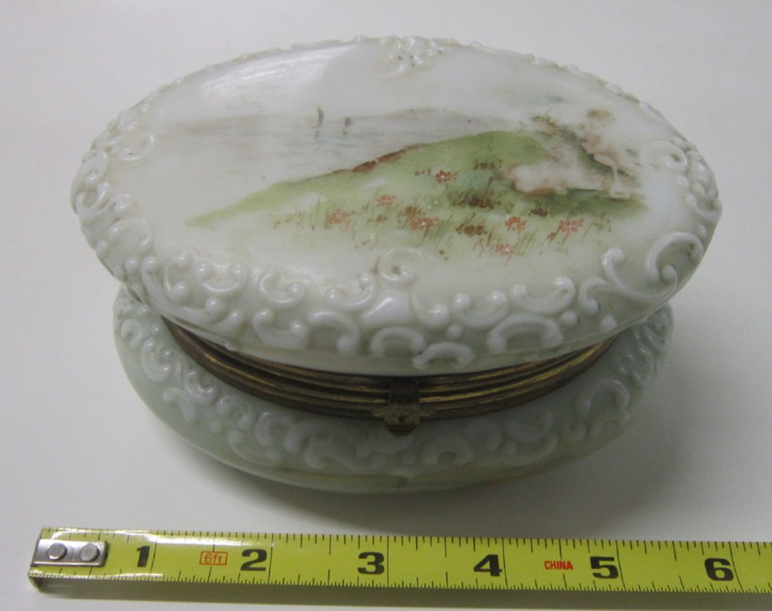 Wavecrest Style Dresser Box: Wavecrest Style Dresser Box, oval embossed opaline glass with boats in pond landscape with Putti and lamb painted lid and body; brass fittings, circa late 19th c, 5 1/4" x 3 1/2" x 2 3/4". CONDITION:
