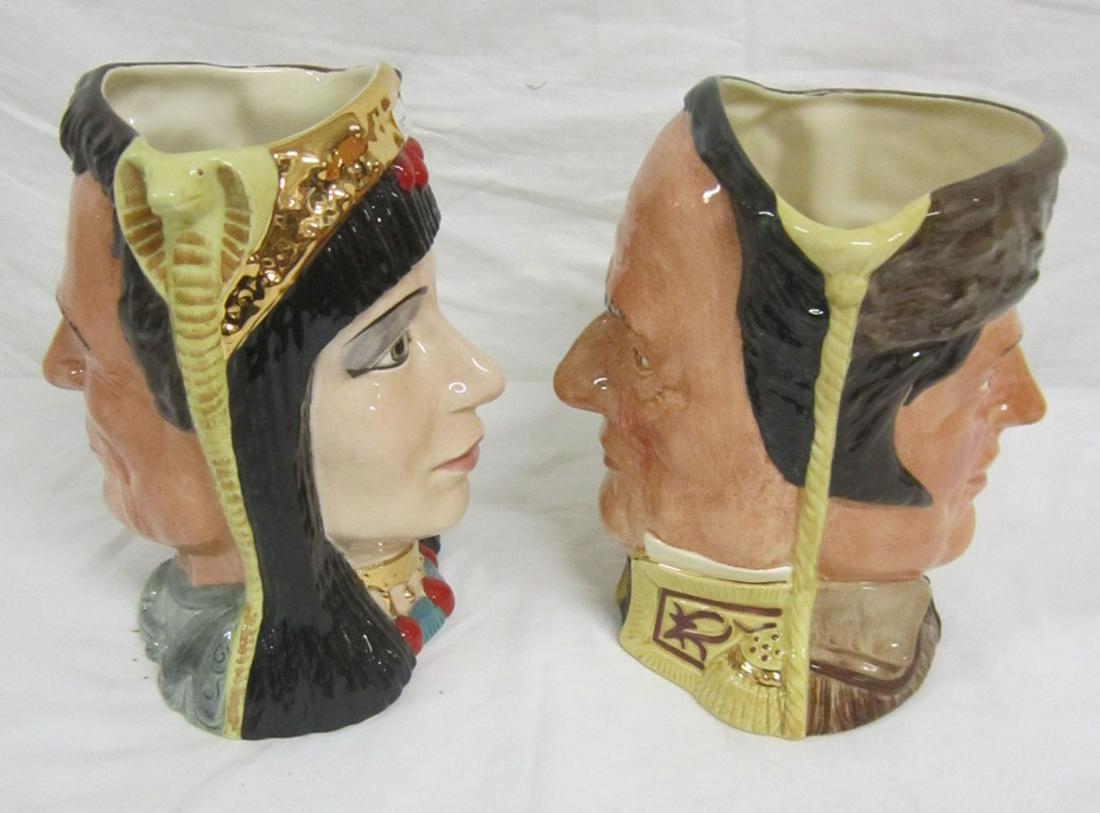 2 Royal Doulton Double Face Mugs: Two Royal Doulton Double Face Mugs, Anthony and Cleopatra D6728, and Davy Crockett and Lopez de Santa Anna D6729, designed by Michael Abberley 1984, limited editions. CONDITION: Like new.
