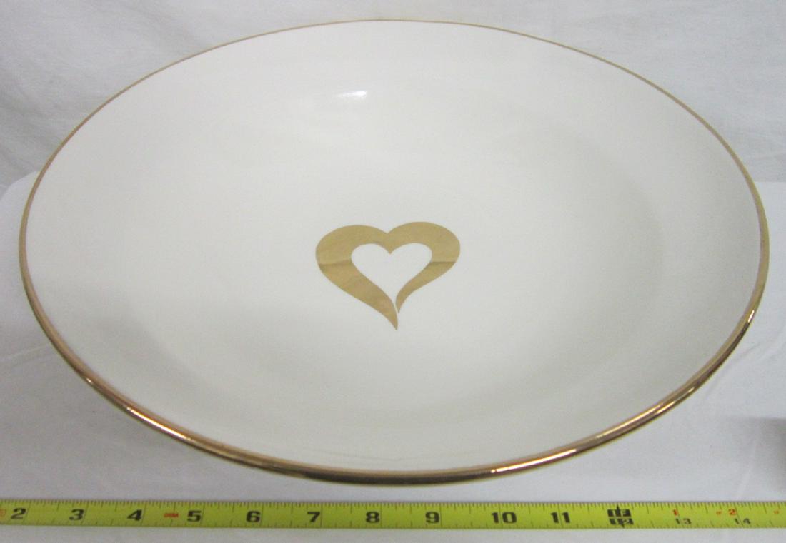 Laurie Gates / Escada Pottery Bowl: Laurie Gates / Escada Pottery Bowl, Los Angeles pottery, limited edition 41 of 110, gold rim and heart center, late 20th C. 14 1/2"d, 3 1/4"h. CONDITION: Very fine.