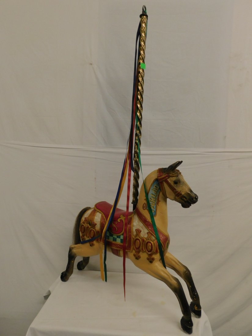 Child: Child's Carousel Horse, polychromed and molded fiber glass outside horse with natural hair tail, painted neck banner "Fair Lad", swirl brass center pole, mid 20th C, 30"l, 30"h (not including brass po