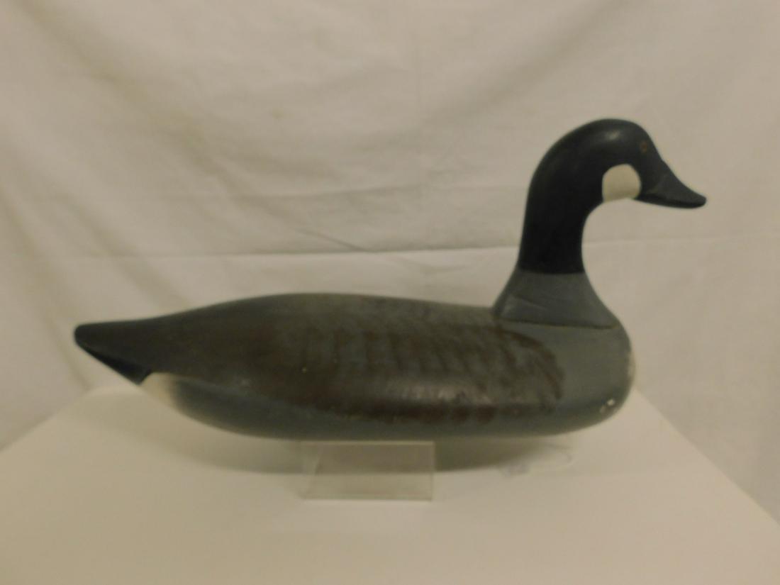Large Decoy: Large Decoy, deceased owner attributed this decoy to Paul Gibson, Maryland, length approx. 20". CONDITION: Few small scratches and paint spots, etc.