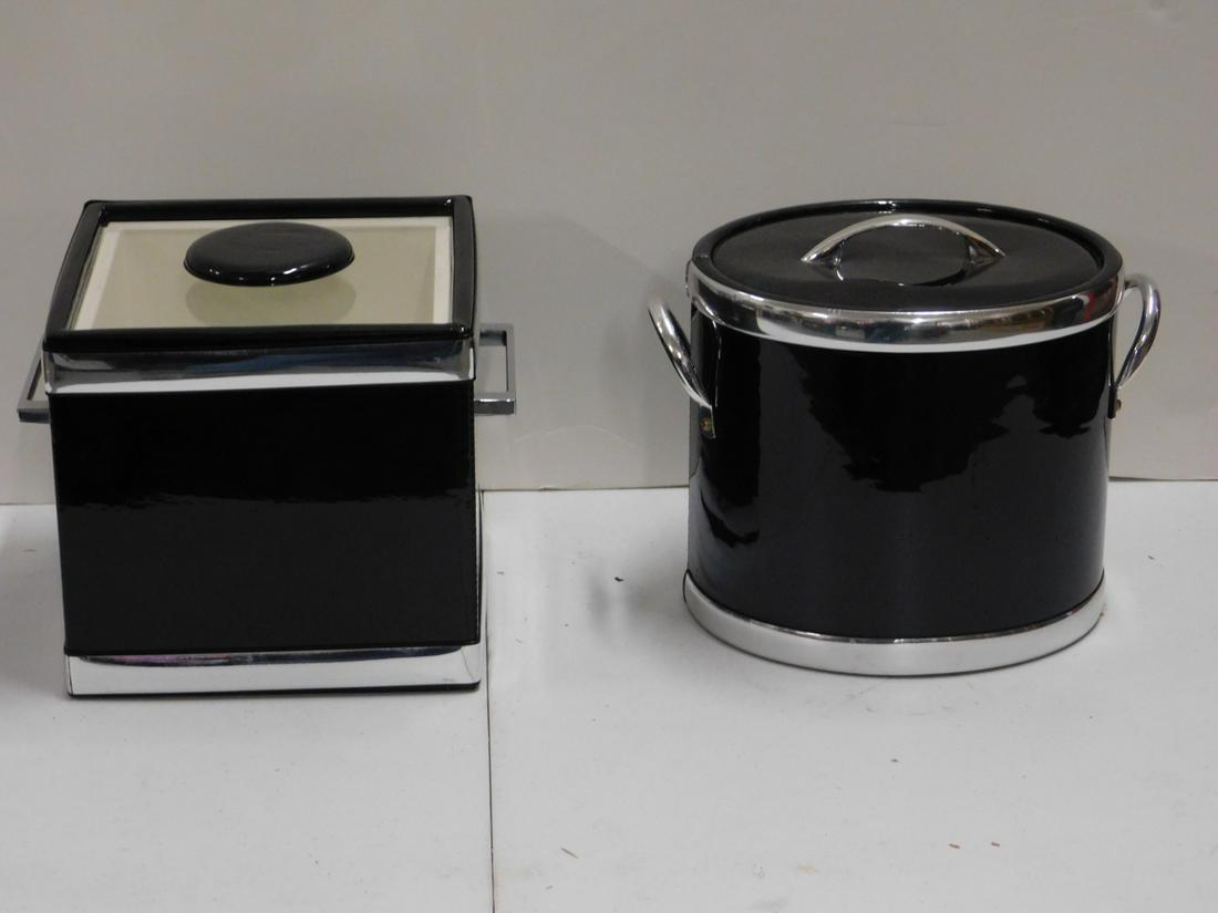 2 Mid Century Modern Ice Buckets: Two Mid Century Modern Ice Buckets by Kraftware, NY, black vinyl with chrome finished bands and handles, includes square 8" x 8" x 7 1/2" with lucite lid, and an oval 8 1/2" x 11" x 7 1/2" and one pai