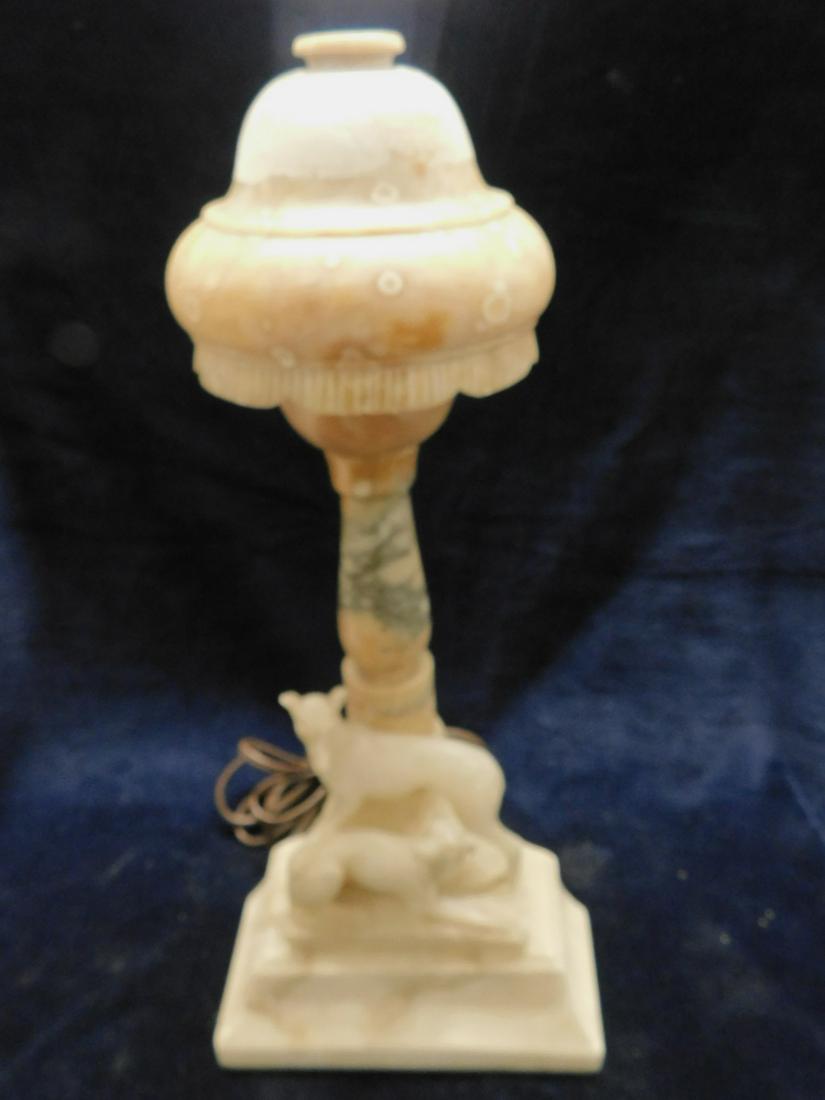 Figural Alabaster Night Lamp: Figural Alabaster Night Lamp, features a stepped dome top on column with two dogs on a shaped plinth, early 20th c, 16"h. CONDITION: Domed lid with white painted top possibly concealing some discolori