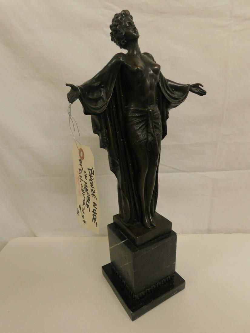Demetre H. Chiparus Bronze Sculpture: Demetre H. Chiparus Bronze Sculpture, Queen Semiramis, partially clad standing female with long robe and outstretched arms; high black marble plinth, signed on rear base of bronze, 17 1/4"h. CONDITION