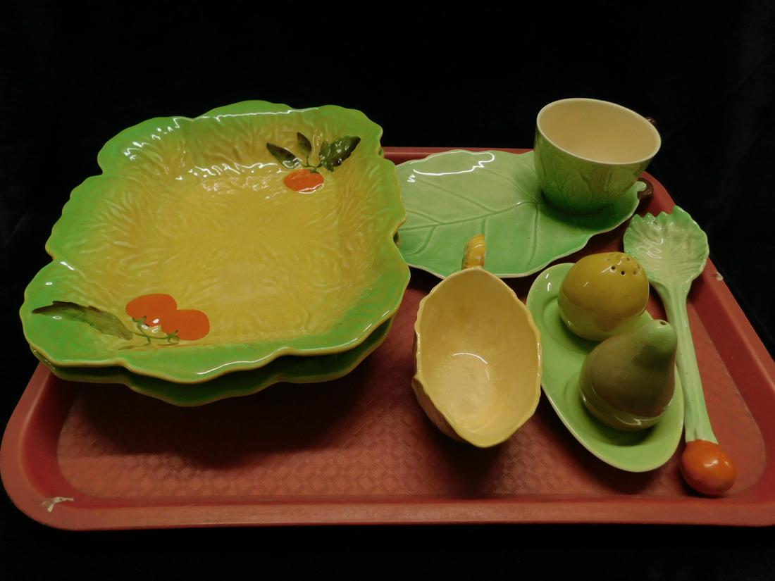Lou Carlton Ware Pieces: Lou Carlton Ware Pieces, made in England including: leaf form luncheon plate with cup; two 8" x 10" serving dishes, 5 1/4" gravy boat, fruit form salt and pepper with under tray, 8 1/4" celery form ve