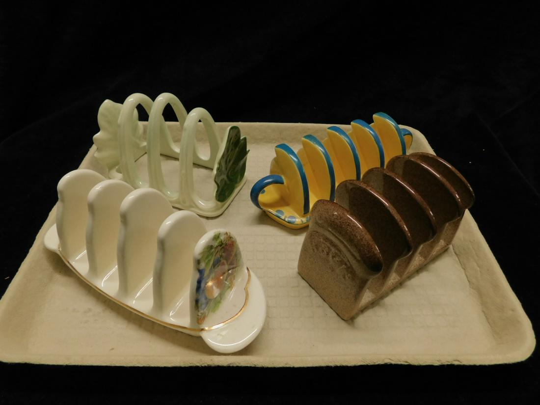 Carlton Ware & Other English Toast Holders: Carlton Ware and Other English Toast Holders, including: two Carlton ware, bread form, 4 1/2" and yellow and blue with ring handled ends, 6 1/2" Royal Winton, white with fruit ends, 6 1/2" and unmarke