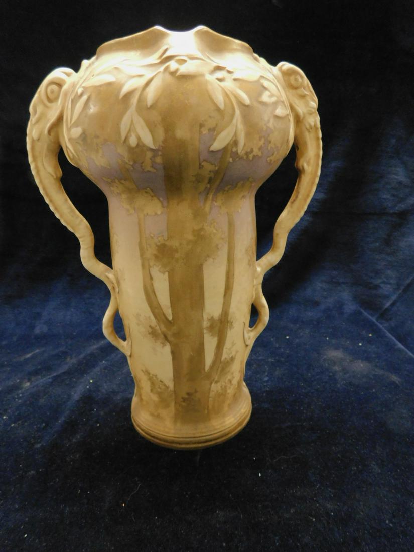 Art Deco Amphora Vase: Art Deco Amphora Vase, bulbous top on cylindrical body with long dolphin formed handles and brown tone painted forest landscape of trees, early 20th C, 10 1/2"h. CONDITION: Faint glaze hair line crack