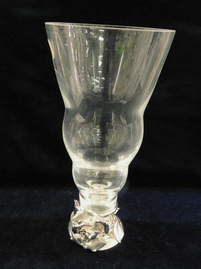 Marcello Giorgio Au Courant Vase: Marcello Giorgio Au Courant Vase, laminated silvered finish metal base of a three dimensional rose with leaves, a shaped clear crystal by Cristallo dei Medici is set into base, retains the original $4