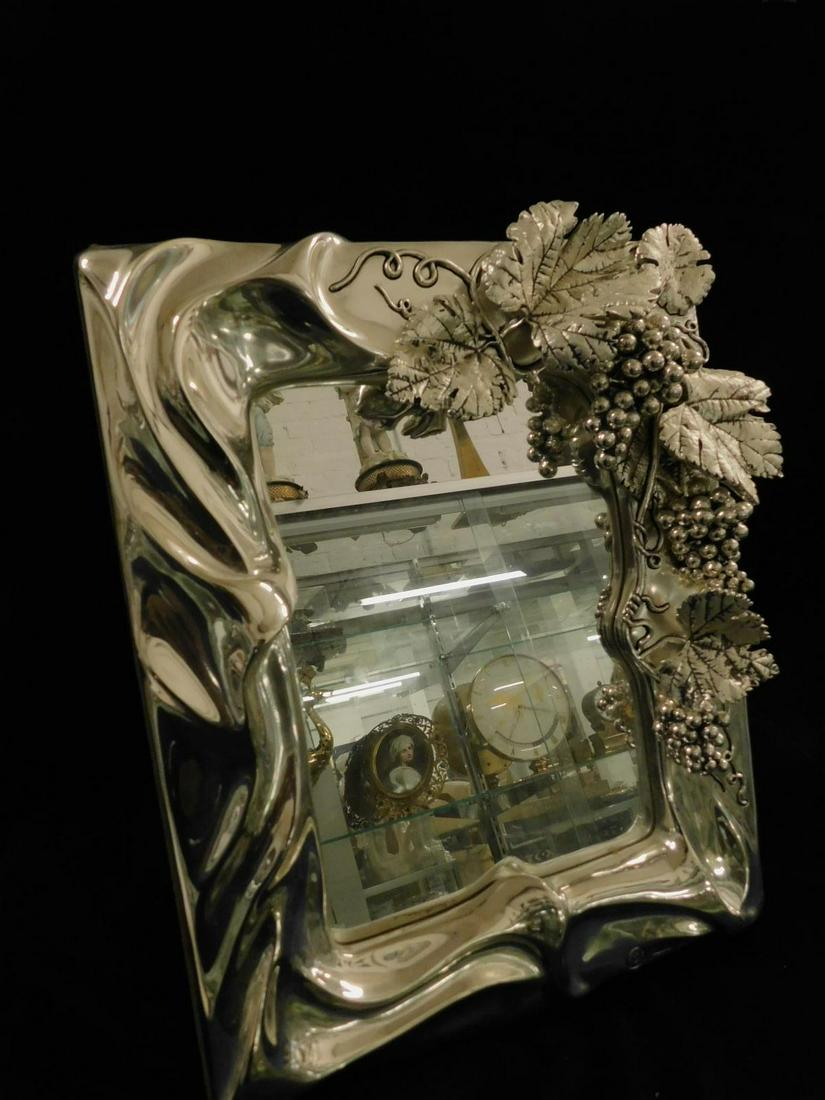 Marcello Giorgio Au Courant Vanity Mirror: Marcello Giorgio Au Courant Vanity Mirror, laminated silver finish three dimensional grape clusters, free standing vanity mirror, artist signed, made in Italy, 20th C, 11 1/2" x 14 1/2". CONDITION: Ve