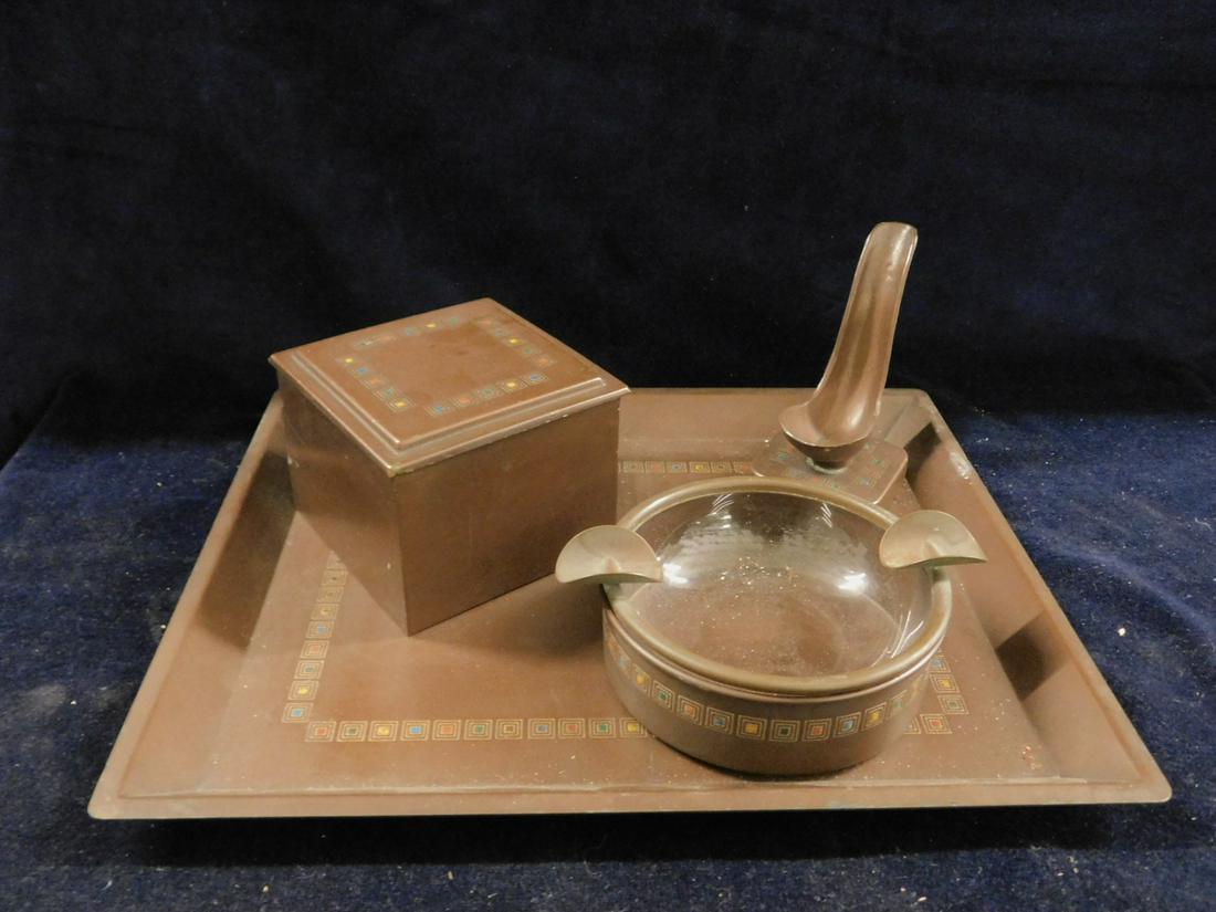 Bradley & Hubbard Smoking Set: Bradley & Hubbard Smoking Set, Art Deco style, dark brown patina brass with engraved and enameled block borders, includes: 11" x 9" tray, square cedar lined hinged box, glass lined round ash tray, and