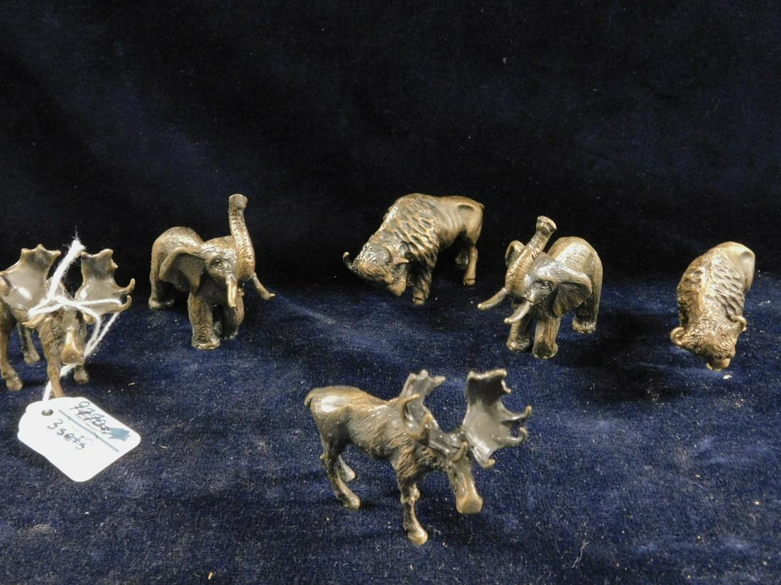 6 Mini Bronze Animals: Six Mini Bronze Animals, detailed sculptured pairs include: buffalo, elephant and moose, 20th c, approx. 3"l. CONDITION: Very fine.