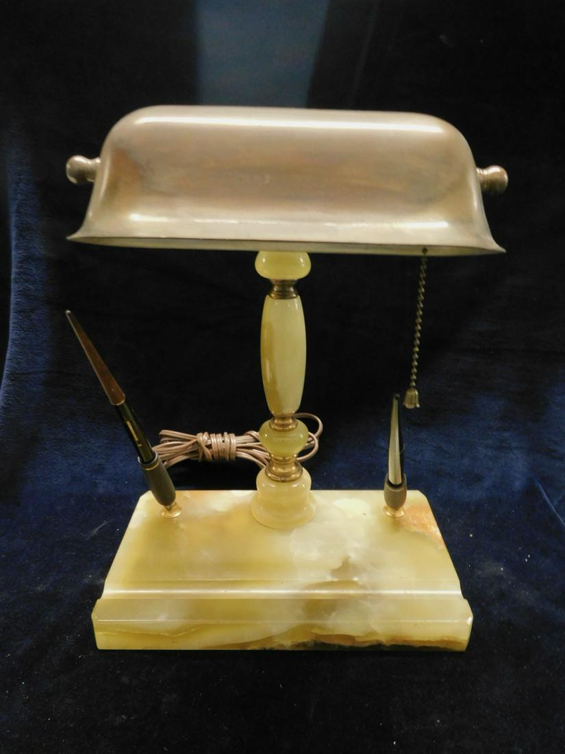 Art Deco Desk Lamp: Art Deco Desk Lamp, green / yellow onyx base and column, brass adjustable shade, two pen stands with unmatching 14k gold tipped fountain pens, early 20th c., 10" x 6" x 13". CONDITION: Tarnished shade