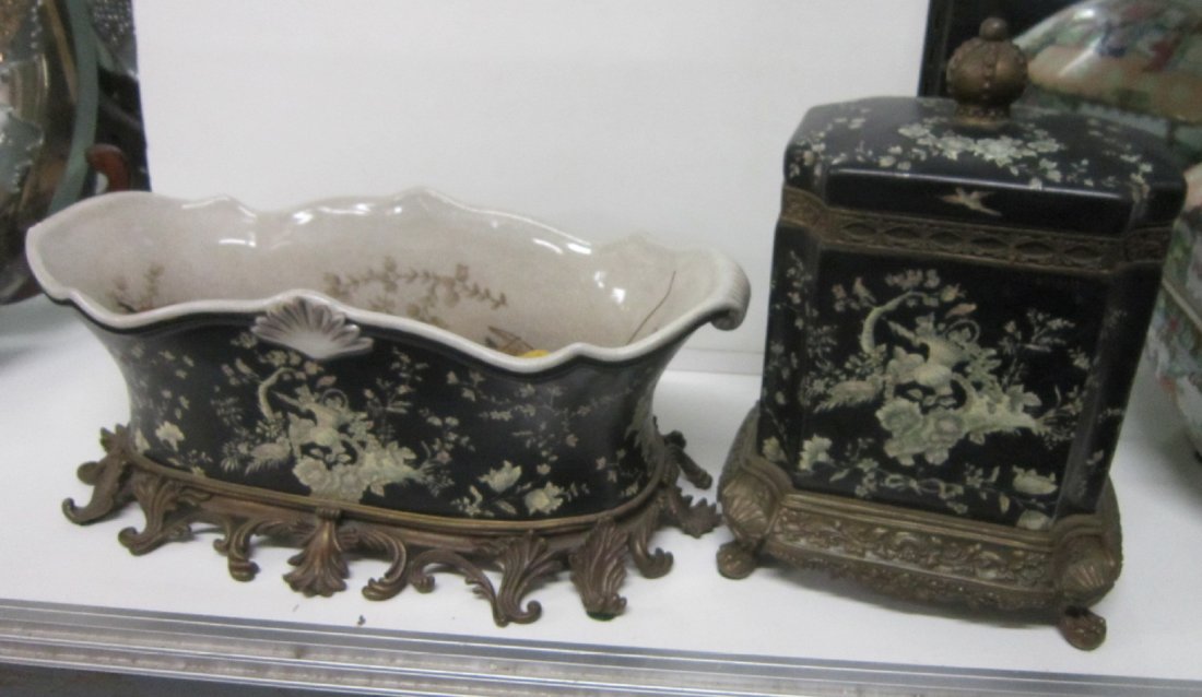 Chinese Porcelain Garniture: Chinese Porcelain Garniture fan, floral and basket decorated crackle glaze, porcelain on black field with Rococo style brass mounts, includes: oval center bowl 17" x 6 3/4" x 9" and covered box 9" x 7