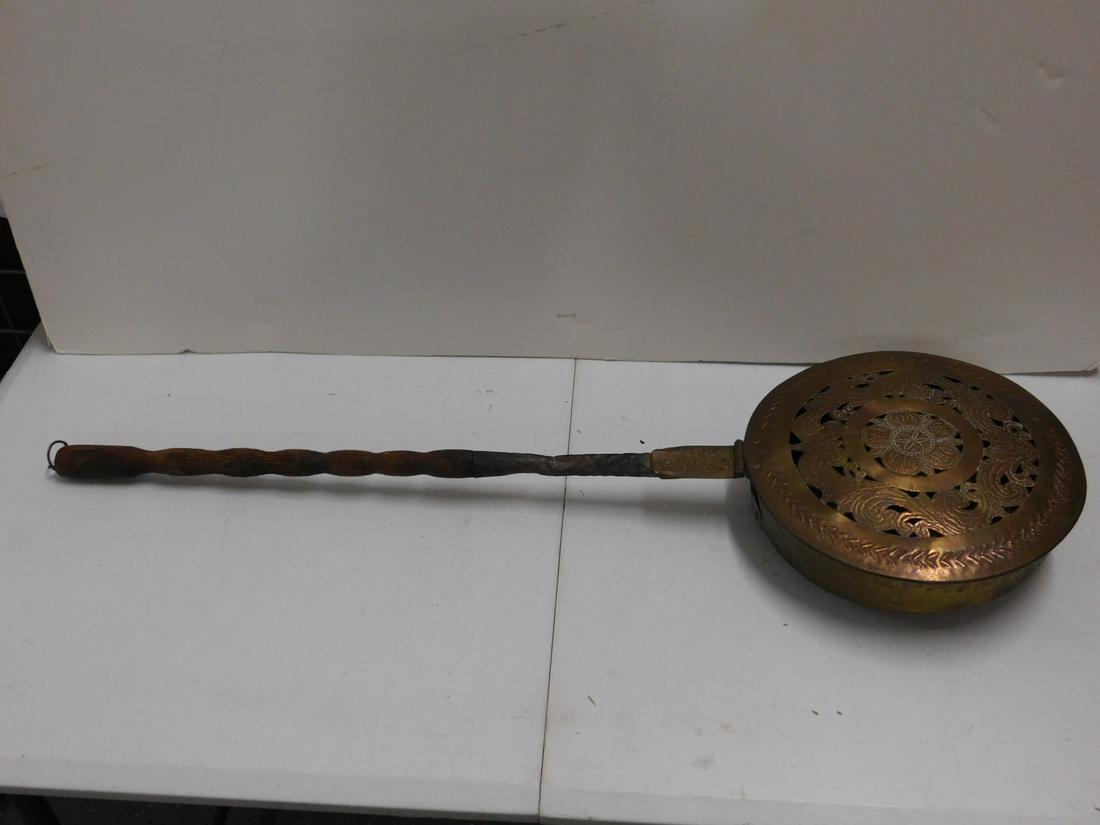 Vintage Bed Warmer: Vintage Bed Warmer, brass pierced and engraved lidded pan with wrought iron and turned wood long handle, 19th / 20th c. 11"d, 36"l. CONDITION: Tarnished finish totally worn off of wood handle.