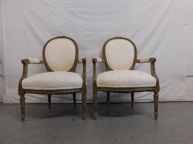 Pr Louis XVI Bergiere Chairs: Pr Louis XVI Bergiere Chairs, rope and ribbon carved cameo backs, gray tone paint finished wood, acanthus carved arms and reeded turned legs, cream brocade cloth upholstery, early 20th C, 34 1/2". CON