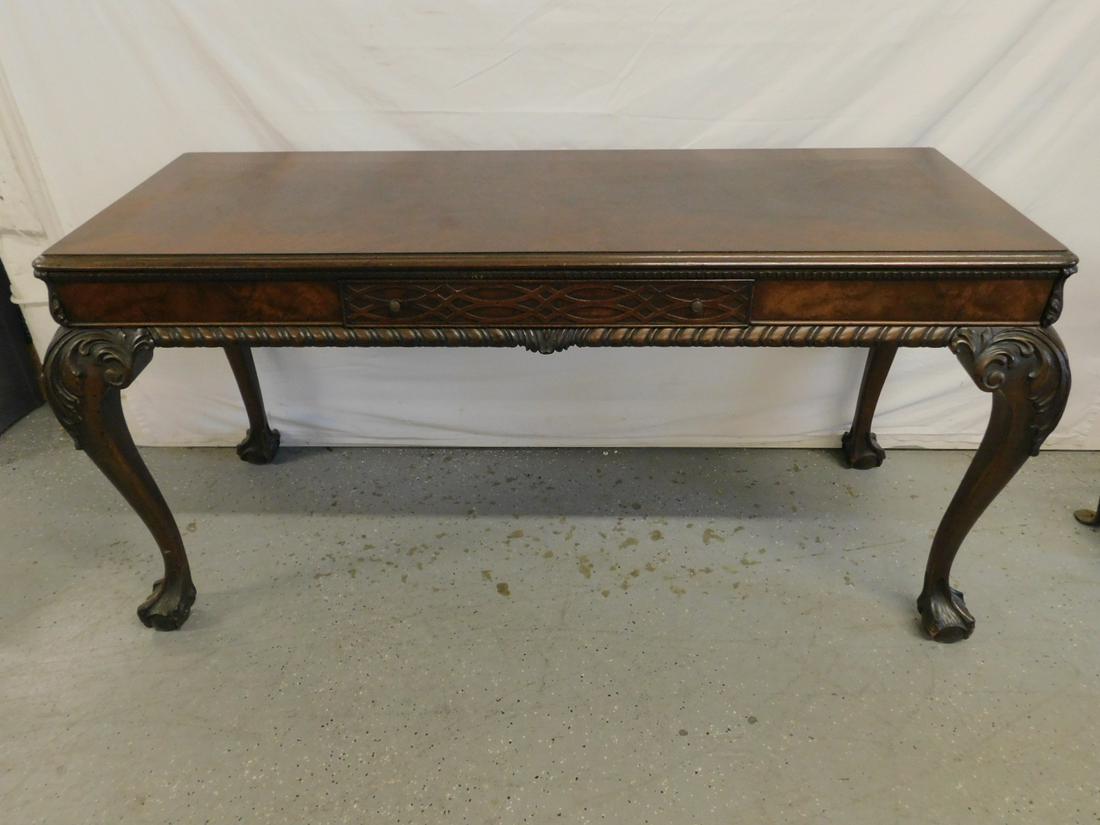 Chippendale Style Library Table: Chippendale style library table, banded mahogany, molded edge crotch veneer top over a gadrooned and beaded fringe with lattice front drawer & drawer leaves, heavy cabriole legs with acanthus scroll k