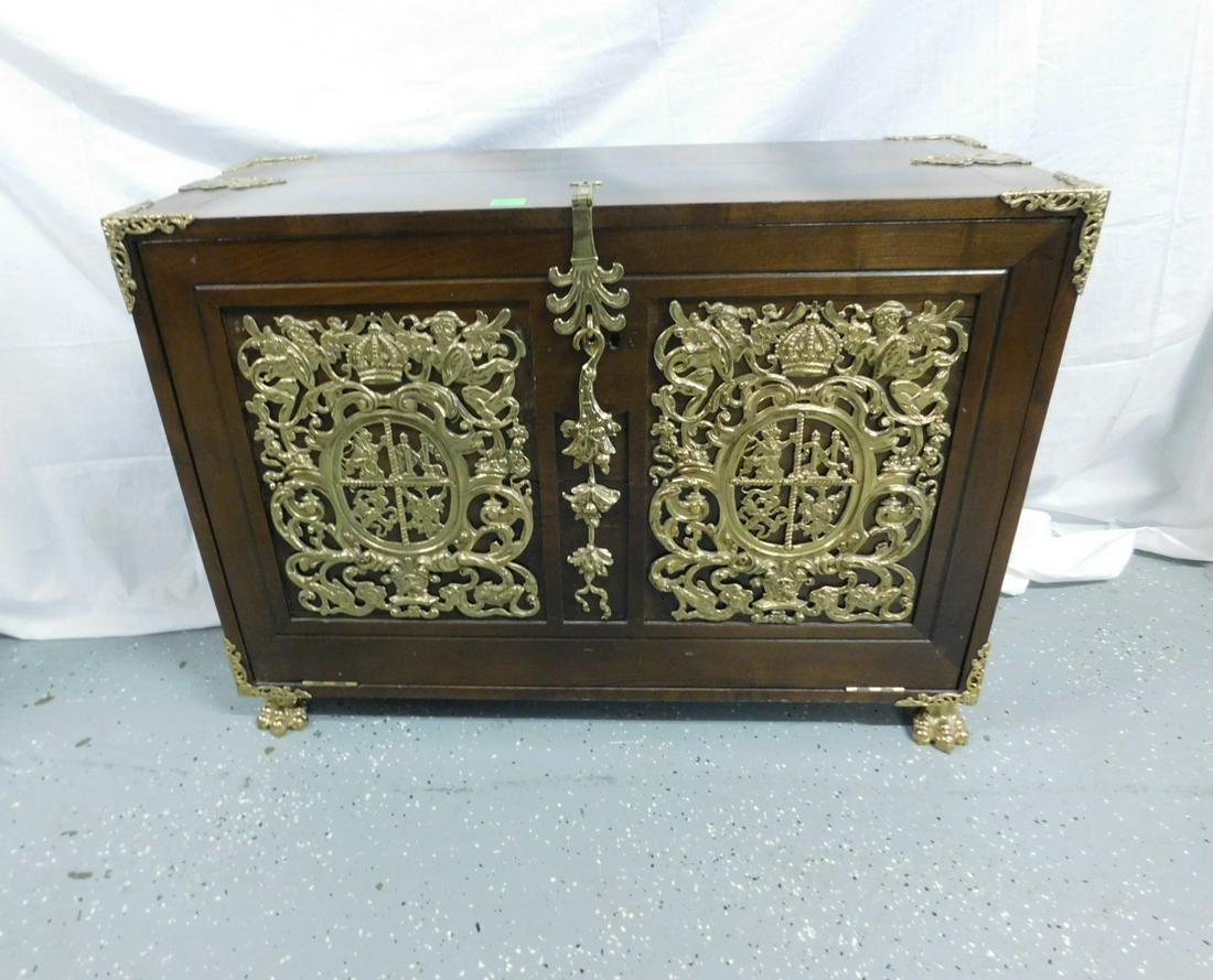 19th C Spanish Barqueno Traveling Desk,: 19th C Spanish Barqueno Traveling Desk,walnut, paneled drop front with interior shelf, embellished with 20th C. elaborate cast brass figural and scroll panels, corner mounts, locks, bale brasses and c