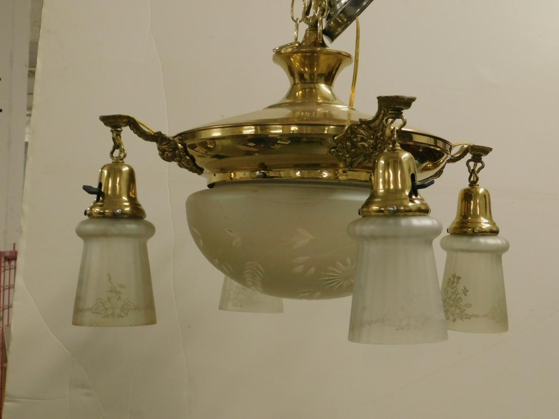 Vintage Brass Chandelier: Vintage Brass Chandelier, brass round frame holds a frosted glass domed shade, four brass arms have pendant frosted shades, early 20th C, 18"d, 22"h. CONDITION: Very good.