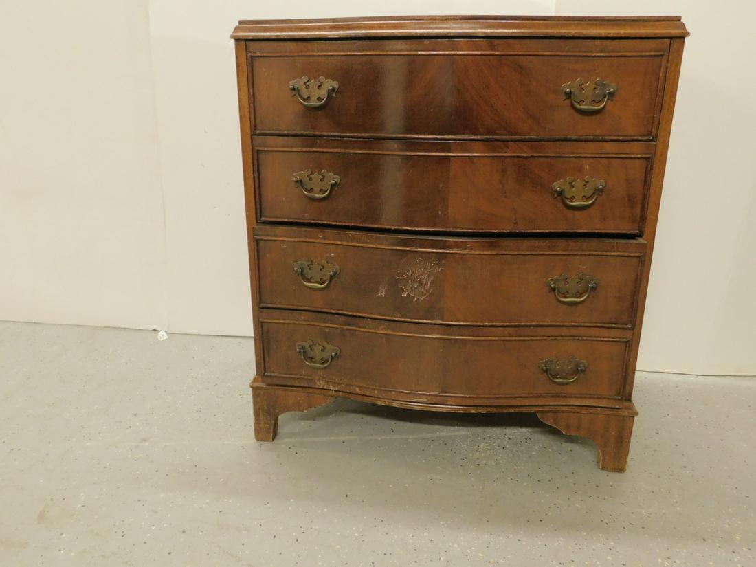 Chippendale Style Bachelor's Chest: Chippendale Style Bachelor's Chest, figured mahogany, serpentine front with four bead molded drawers, bracket feet, mid 20th C, 28" x 18" x 31". CONDITION: Numerous areas of finish wear and losses.