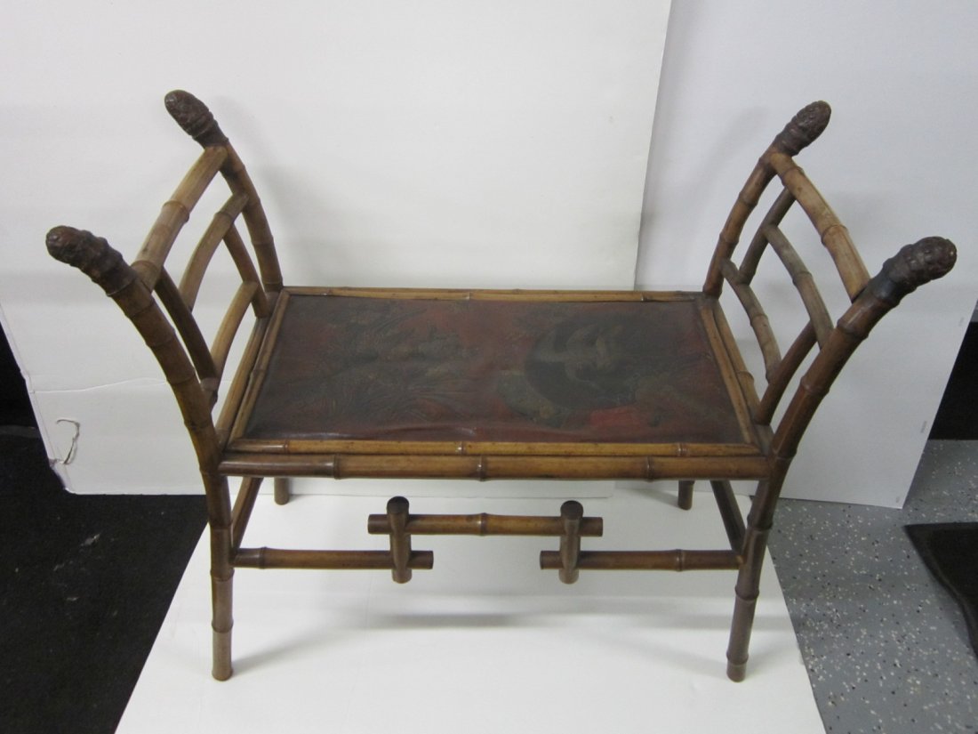 Bamboo Fireside Bench: Bamboo Fireside Bench, Oriental influence with raised side arms tooled and polychromed leather seat with Oriental style bird and flower design, 15" x 29" x 32". CONDITION: Good, used condition.