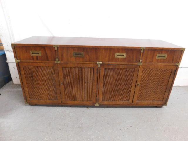 Henredon Campaign Style Sideboard: Henredon Campaign style sideboard, mahogany, brass mounts, features 3 drawers over 4 reeded paneled doors, circa 1960 - 70, 68" x 19" x 30 1/2". Condition; very good, light useage