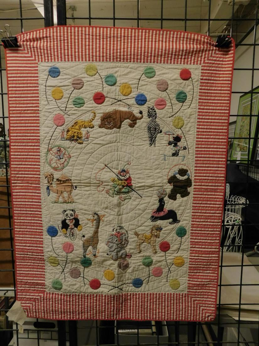 Vintage Circus Crib Quilt: Vintage Circus Crib Quilt, red and white striped border with center clown ringmaster surrounded by circus animals and balloons on one side, plain on reverse by Maude Cochran, circa 1950s, 33" x 45". C