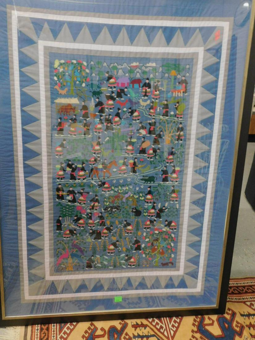 Framed Laos Hmong Story Cloth: Framed Laos Hmong story cloth Crib Quilt, hand embroidered with black and red garbed workers shrubbery and animals, blue, gray and white borders, late 20th C, 39 1/2" x 53 3/4". CONDITION: Very fine, 