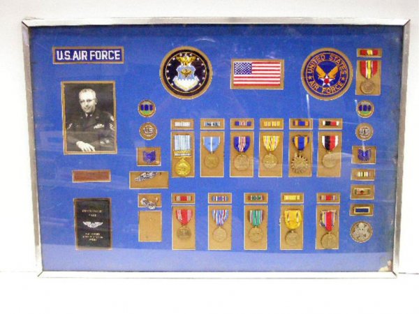 World War II & Korean War Medals Display: World War II & Korean War United States Air Force medals & patches display, belonging to Master Sgt. Morrie K. Kay, 33" x 23 1/2" framed.