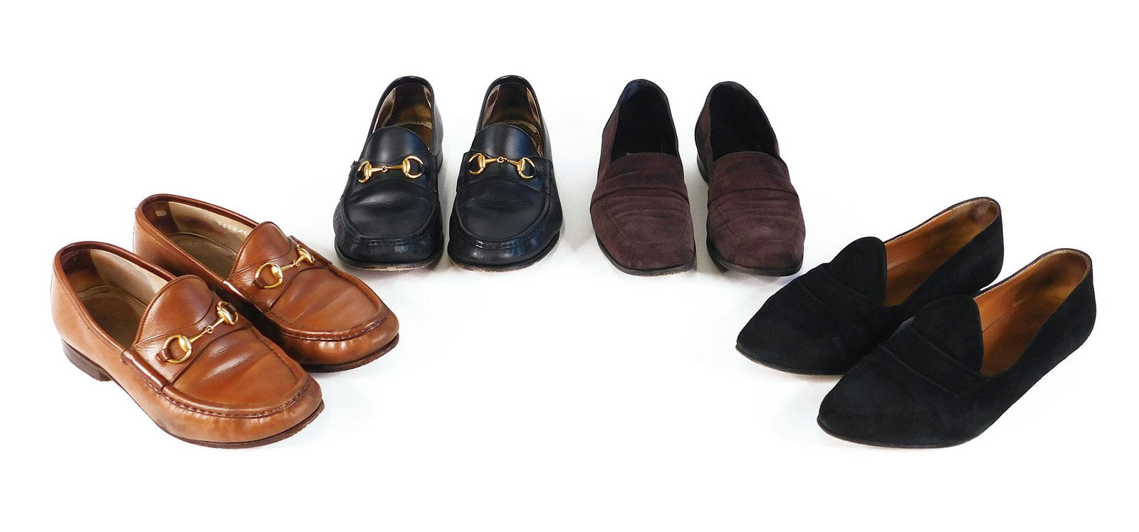 Giorgio Armani, Gucci: Four Pairs WomenÂ’s Shoes: Four pairs women’s vintage shoes. Comprised of two pairs Gucci leather loafers, one black and one brown, both marked size 7B, both with gold colored hardware; one pair Armani black suede shoes on a
