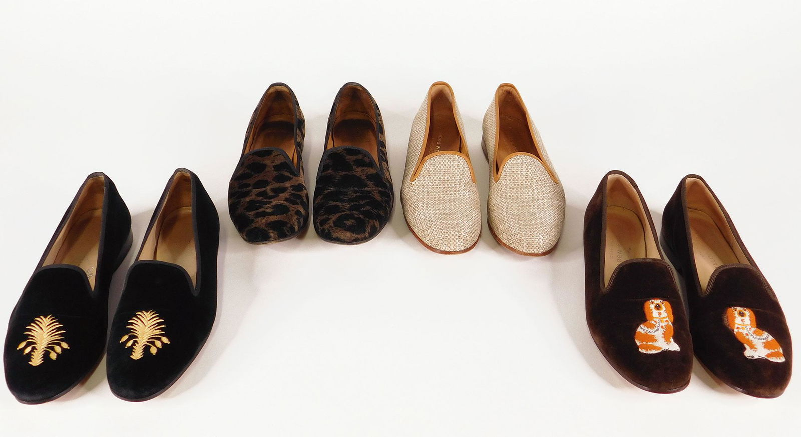 Stubbs and Wootton: Four Pairs Women’s Shoes: Four pairs Stubbs and Wootton women's shoes, all size 7. Comprised of one pair leopard print velvet slippers; one pair tan woven raffia slippers; one pair brown velvet slippers with embroidered dog mo