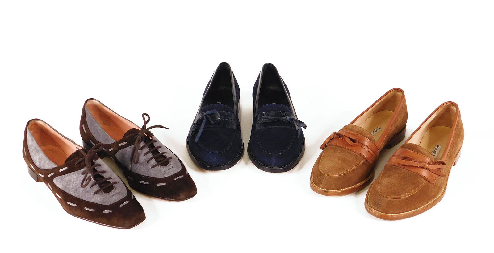 Manolo Blahnik: Three Pairs Women’s Loafers: Three pairs Manolo Blahnik women’s loafers, all size 37. Comprised of one pair “Pagana” in brown suede, one pair “Pagana” in navy suede, and one pair “Ritarda” with laces. In original bo
