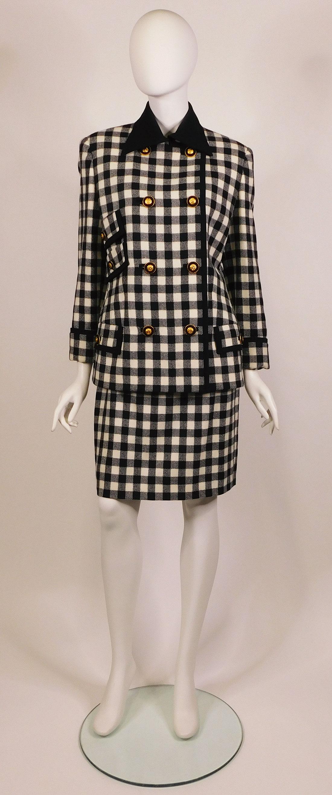 Gianni Versace Couture Wool Skirt Suit: A Gianni Versace Couture wool skirt suit with brass Medusa buttons. 1980s. Both pieces size 44 (size 10 US). 100% wool, lining 100% rayon. Made in Italy. Condition: Very good generally, no notable def